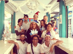 Team Christmas photo, Kelly is top row first one on right