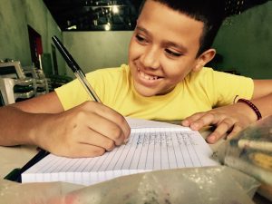 HCA student working diligently on an assignment