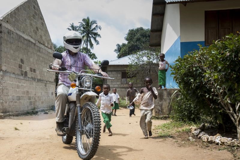 Image of man motorcycling
