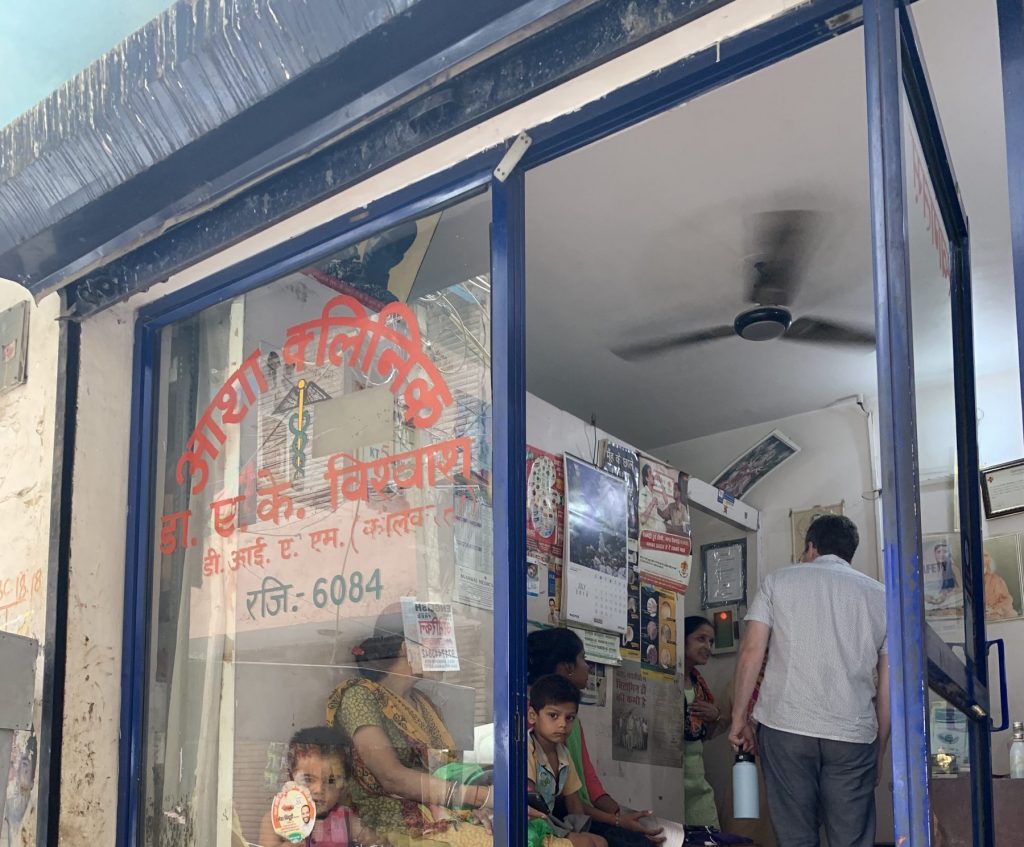 An Operation ASHA community health center in India with patients awaiting TB medication