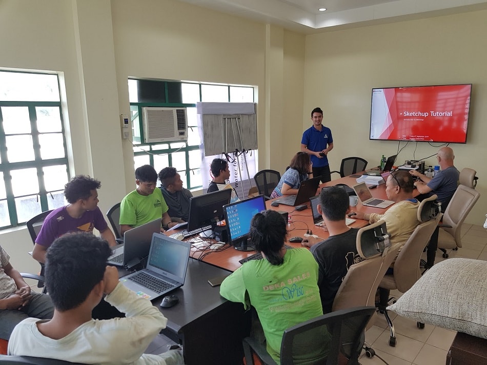 Stephen leading an AutoCAD teaching session with AIDFI team in Philippines